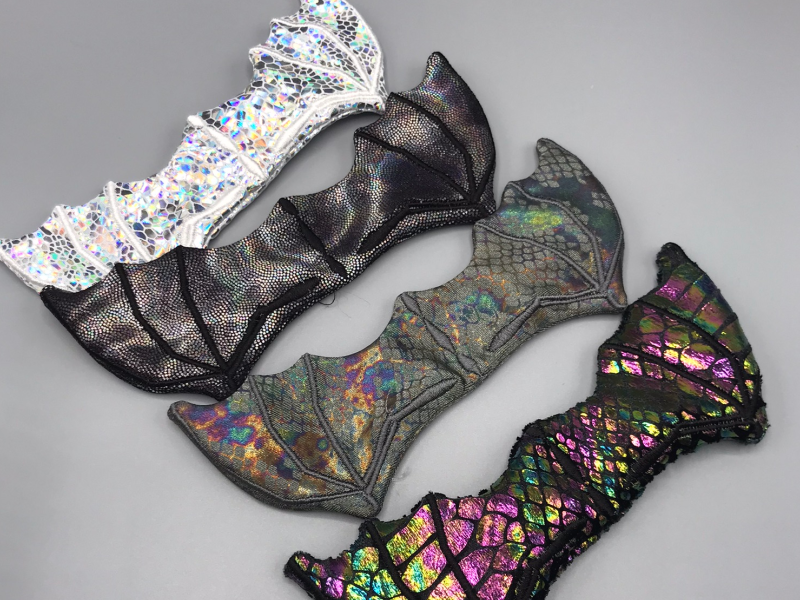 Four iridescent dragon wings