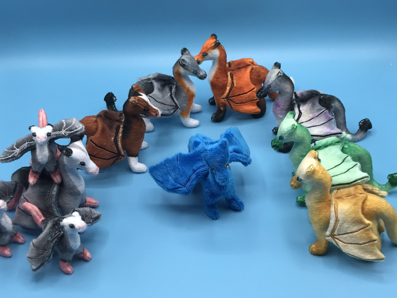 Possum dragons and other preprints, compared to a plain blue minky dragon.