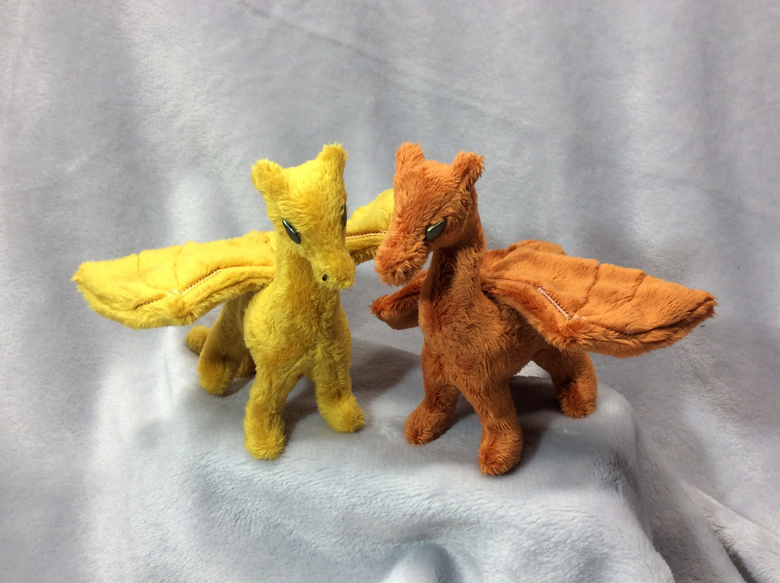 More standing plush dragons