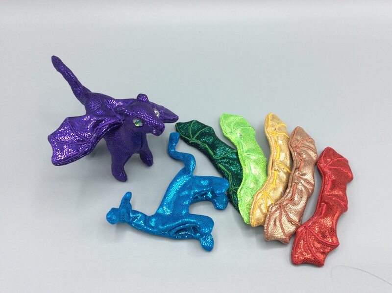 &quot;Plush&quot; dragon made from spandex, with glass eyes that stand above the fabric surface